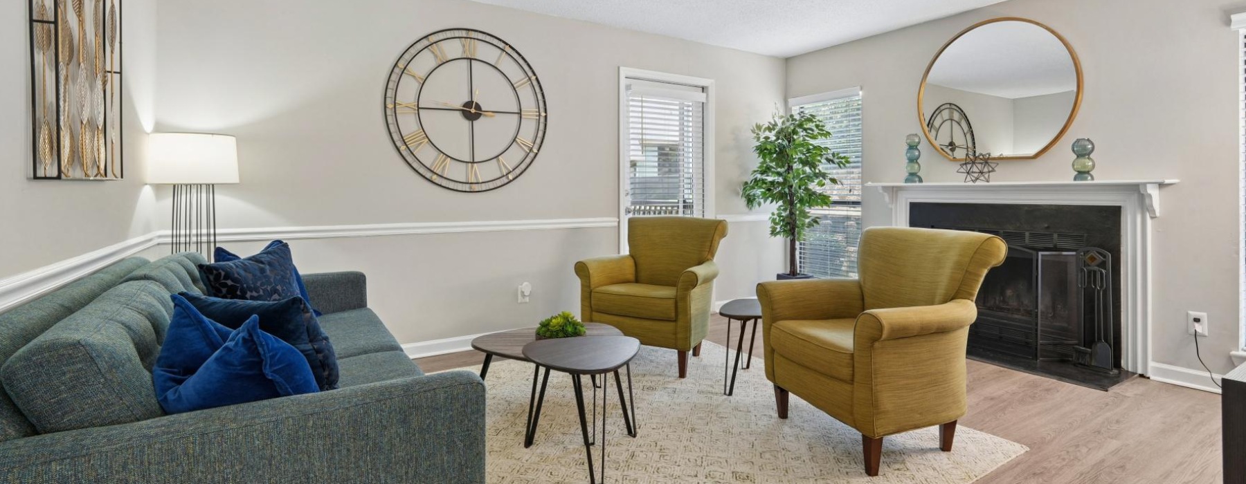 a living room with a fireplace