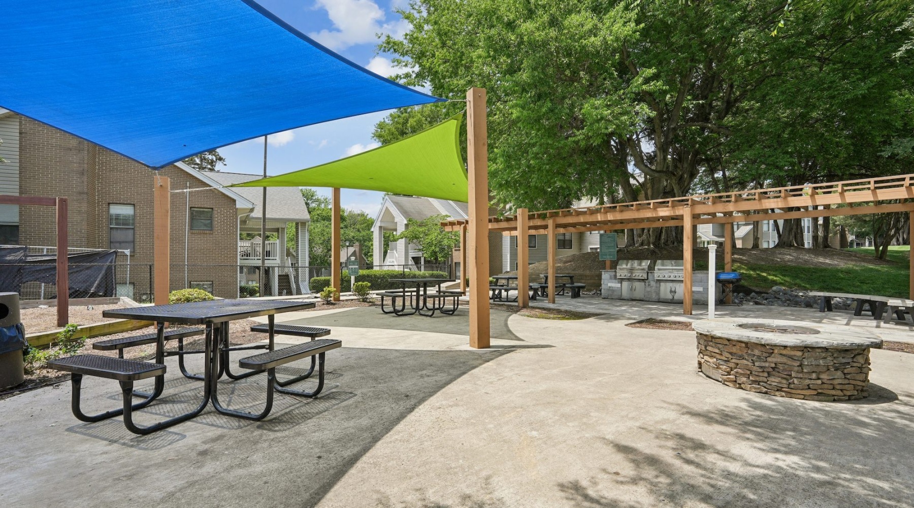 a picnic table and umbrellas